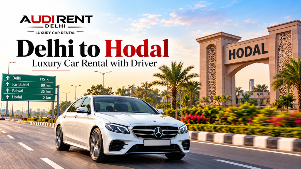 White Mercedes-Benz luxury car travelling on the Delhi–Hodal highway near a Hodal entrance landmark, promoting chauffeur-driven luxury car rental by Audi Rent Delhi.